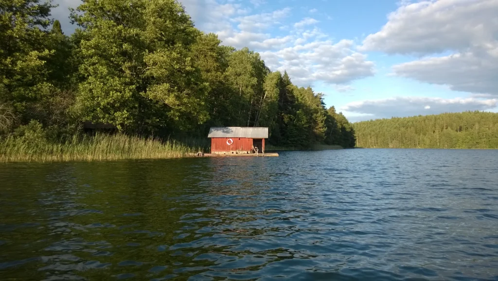Cabin an Clear Lake by a forest